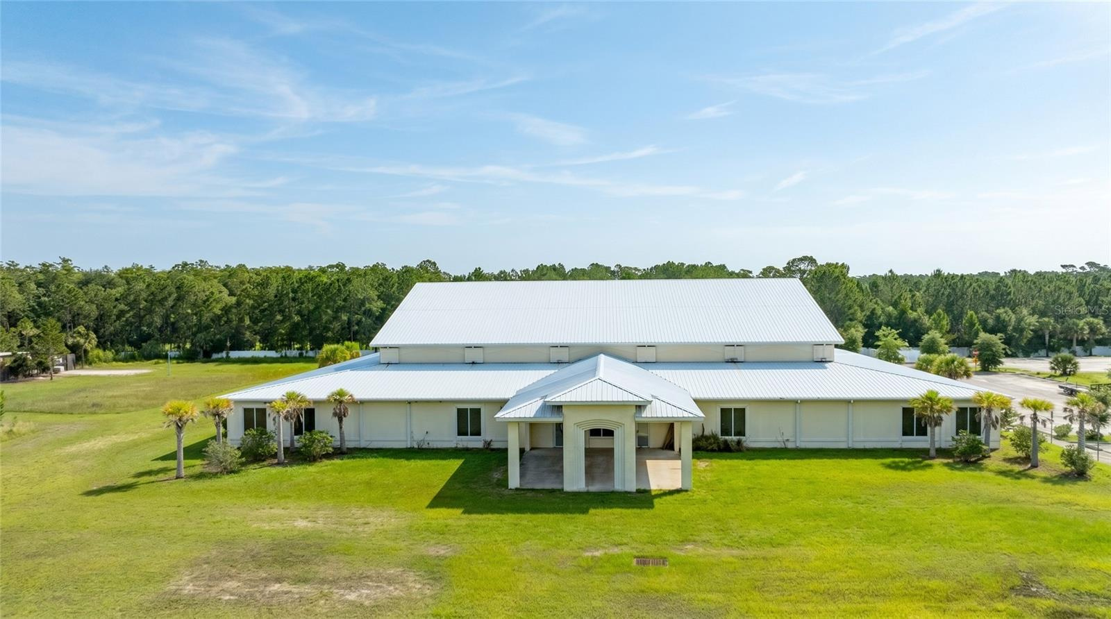 Church / School Building on 8 Acres with 25,000 commercial building shell for sale in Port Orange, FL